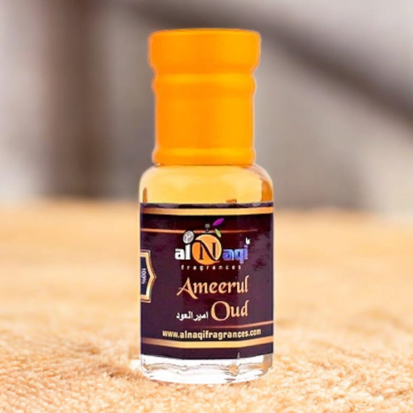 Ameerul Oud attar displayed in a luxurious setting