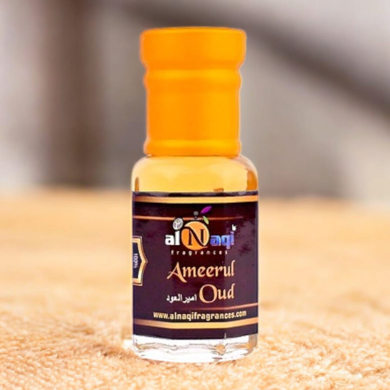 Ameerul Oud attar displayed in a luxurious setting