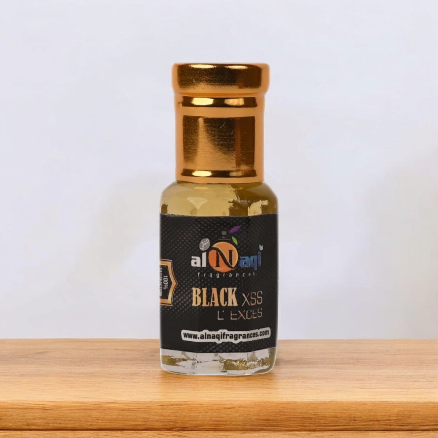 Close-up of attar bottle emphasizing elegant details.