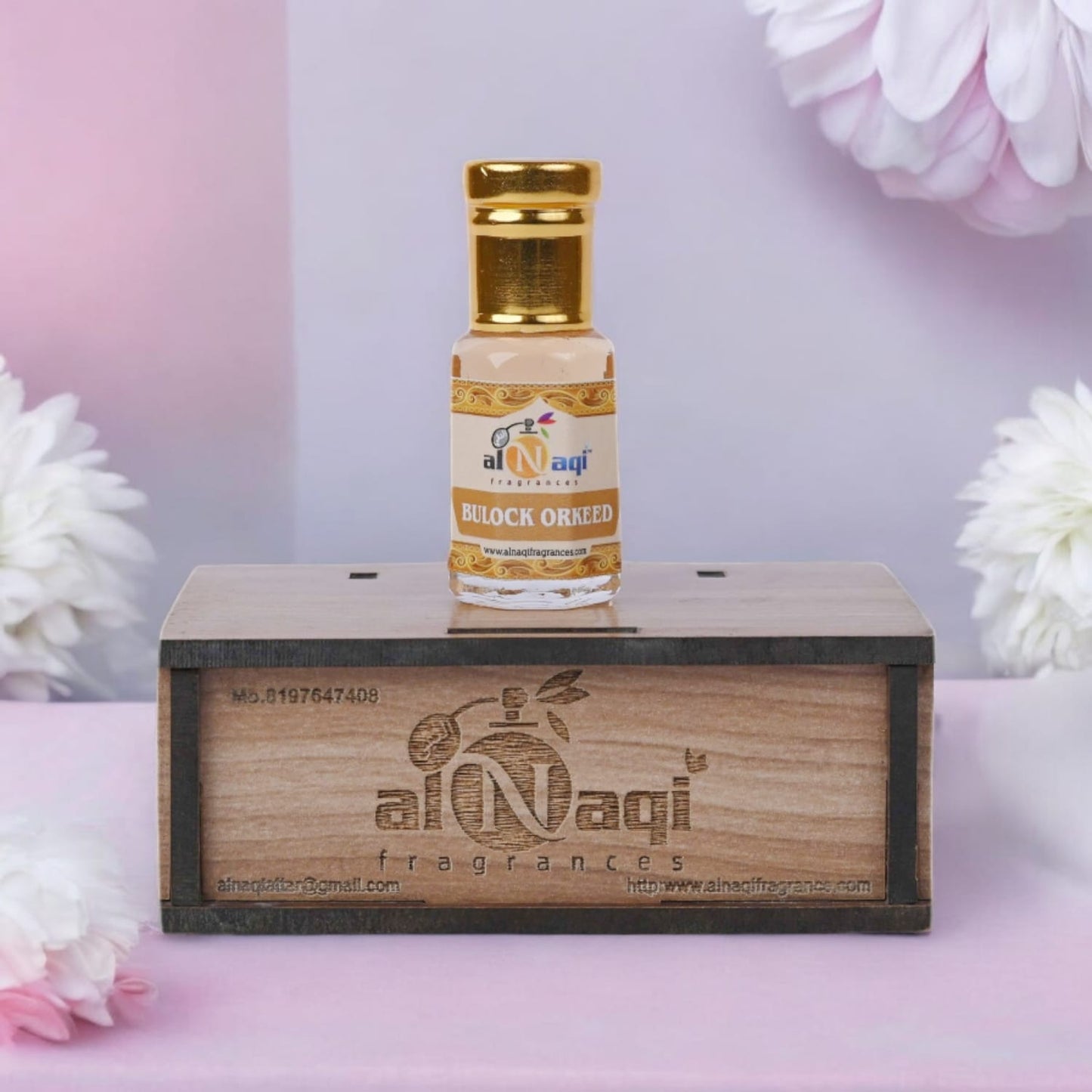 Close-up view of rich, deep amber fragrance in a sleek container