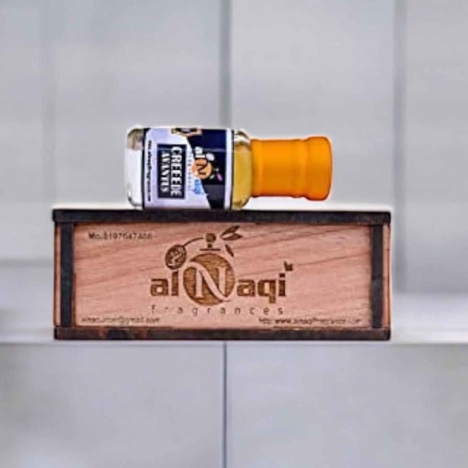 Close-up of premium perfume oil in an elegant container