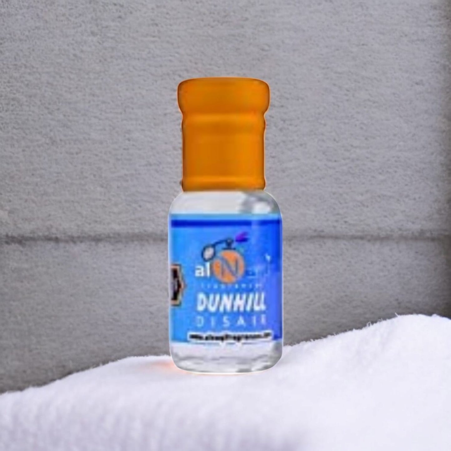 Elegant bottle of Dunhill Disair Attar by Alnaqi