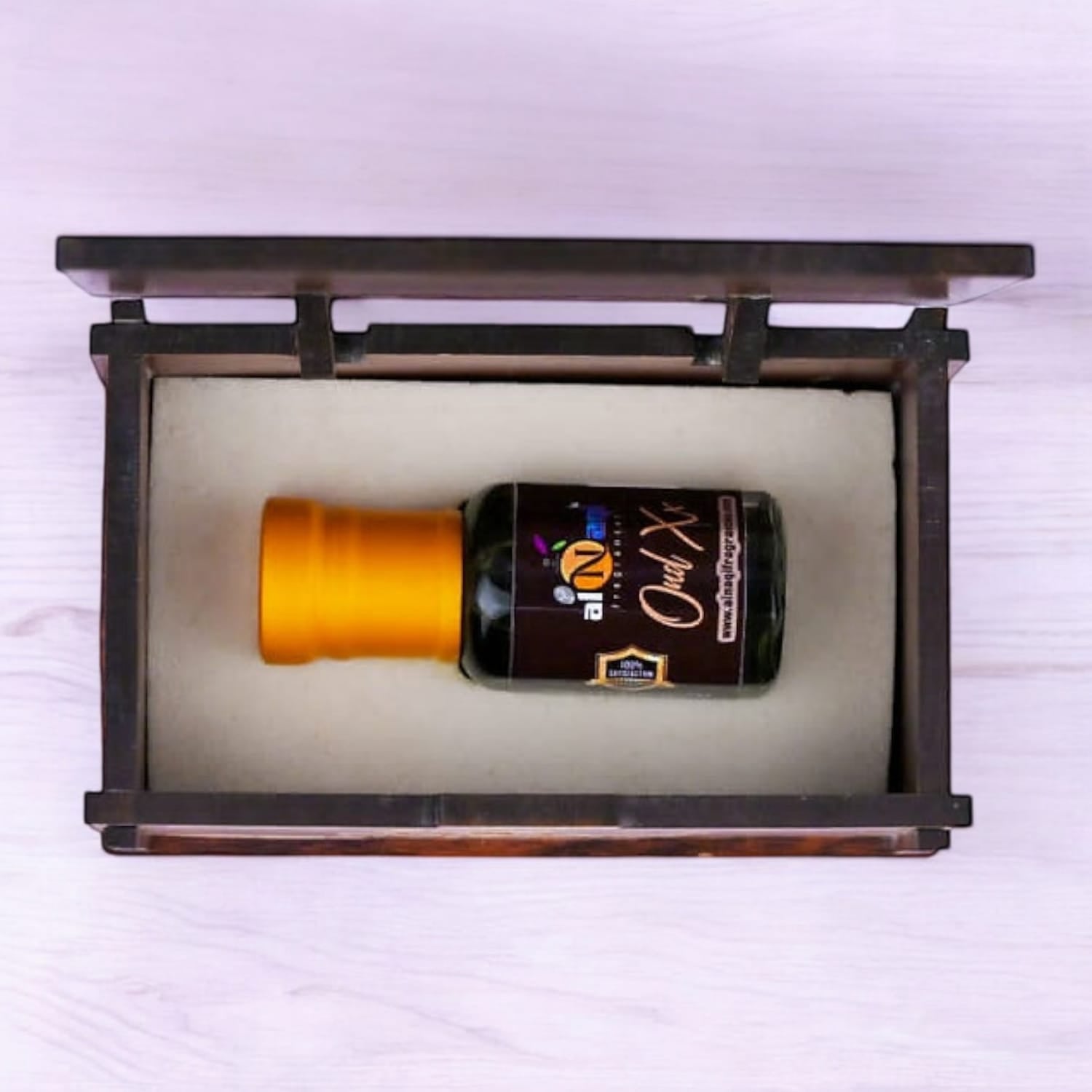 Sophisticated bottle of Alnaqi Oud XX Essence Attar