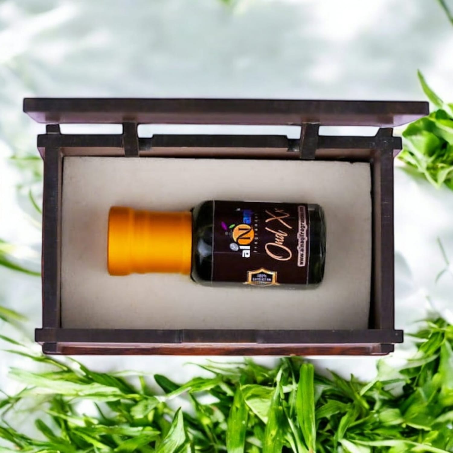 Detailed shot of Alnaqi Oud XX Essence label