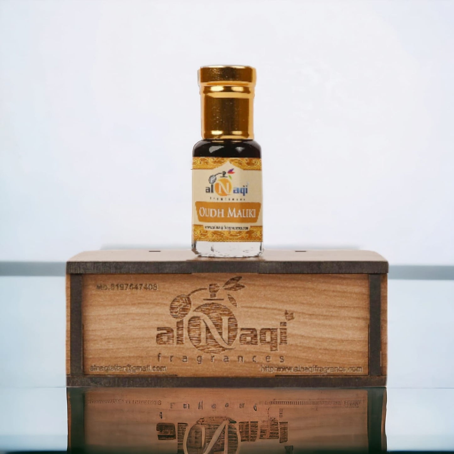 Opulent perfume bottle with a backdrop of aromatic ingredients.