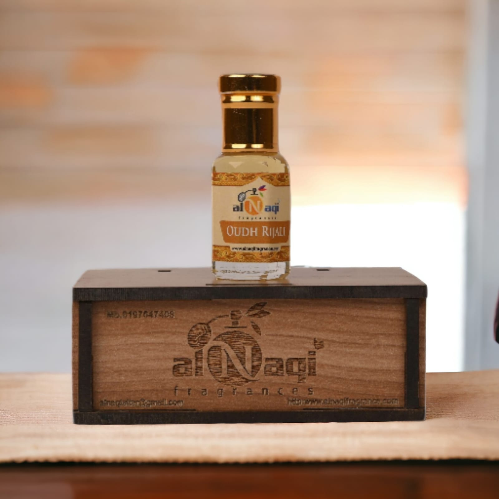 Sophisticated perfume bottle with golden accents on a dark surface.