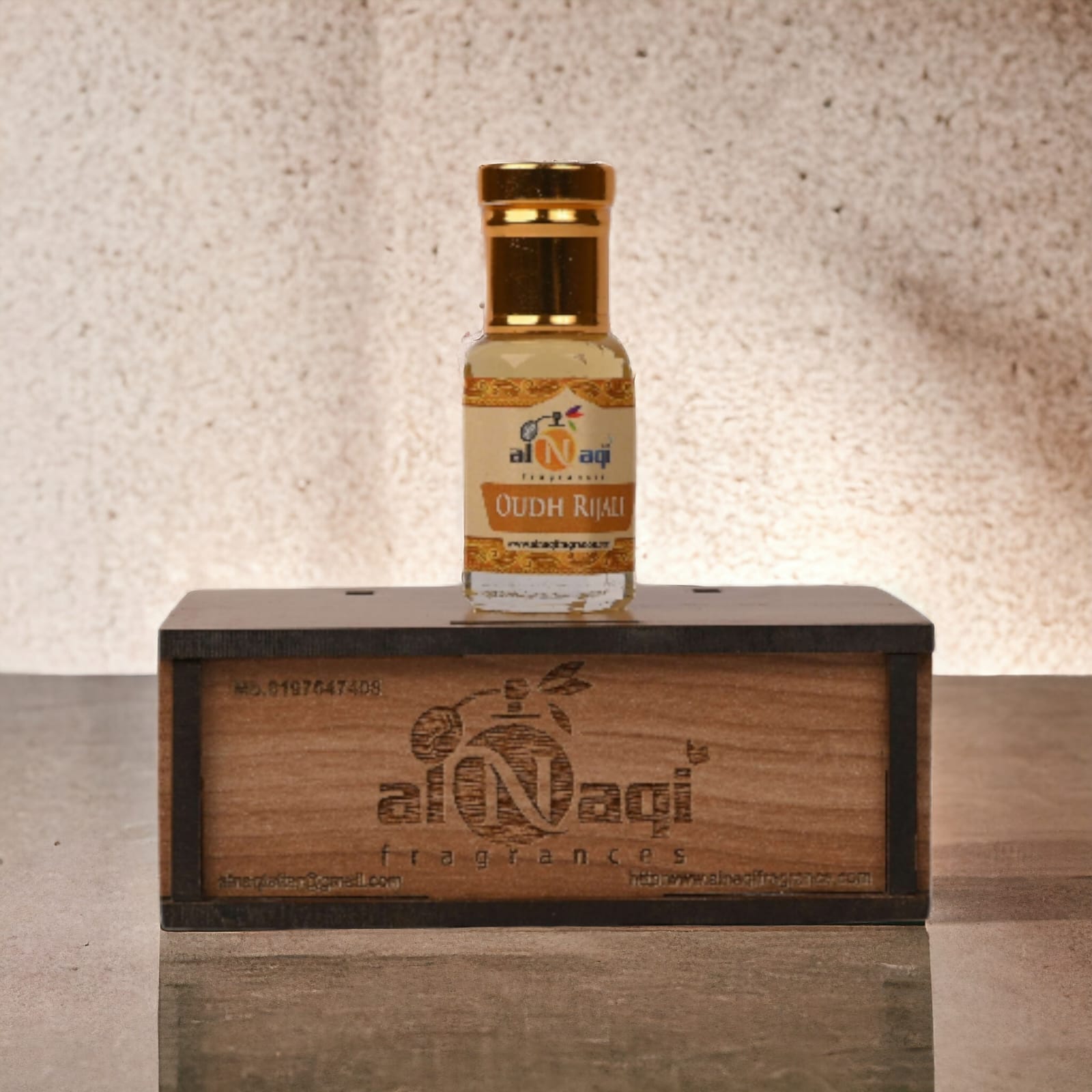 Artistic display of aromatic essential oil in an ornate container.
