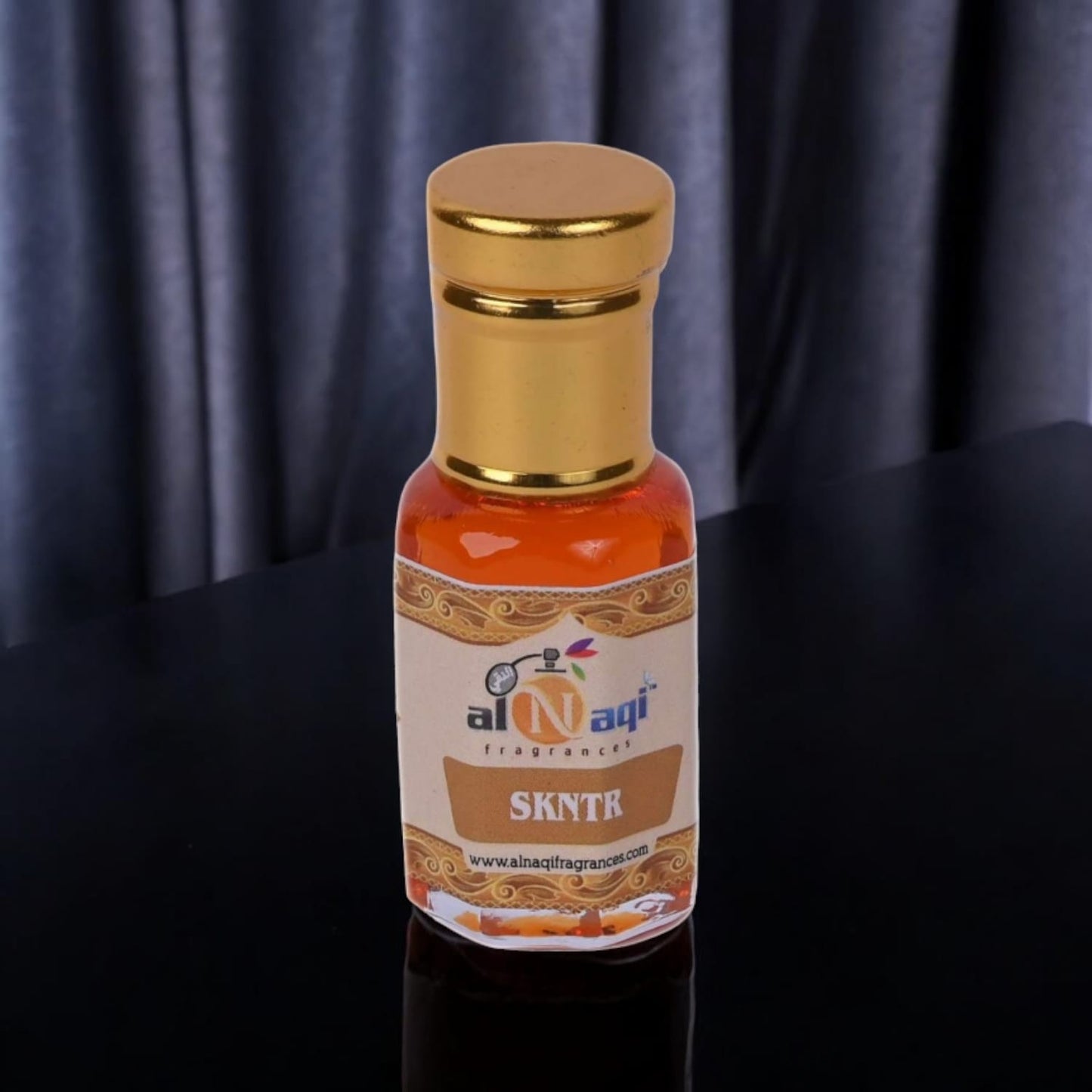Close-up of rich amber fragrance in a luxury container