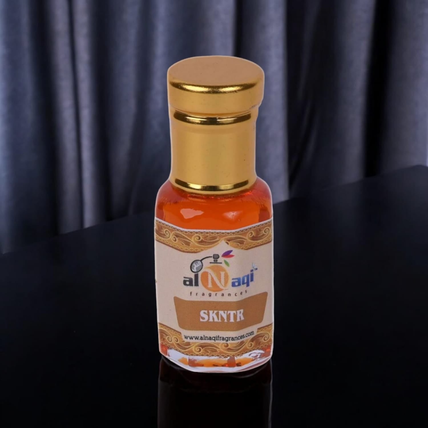 Close-up of rich amber fragrance in a luxury container