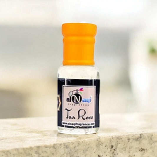 Elegant glass bottle of Alnaqi Tea Rose Essence