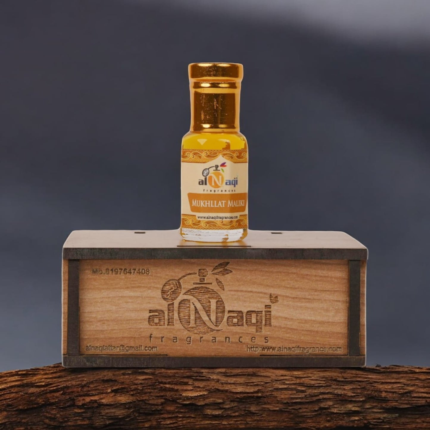 Mukhallat Maliki attar arranged with other premium fragrance oils
