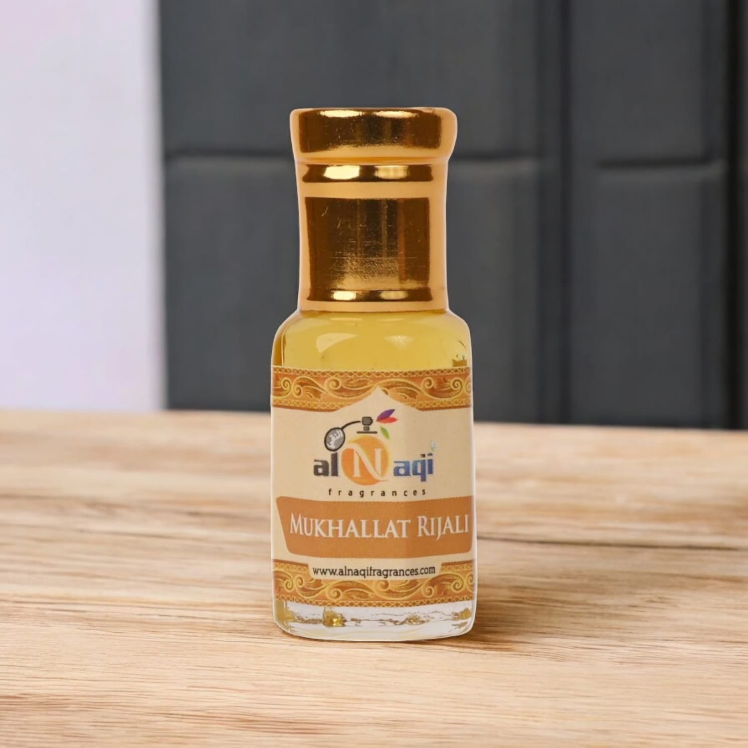 Top view of Mukhallat Rijali attar showing luxurious bottle shape