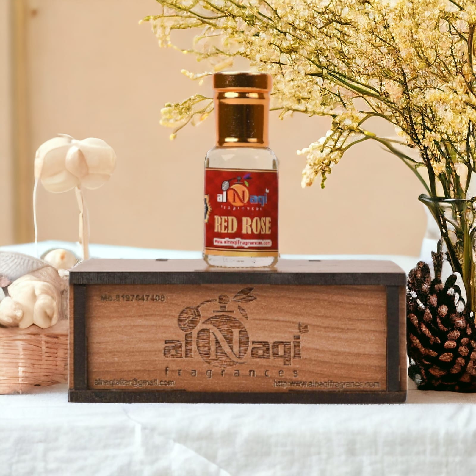 Richly scented red rose attar in a classic glass vial