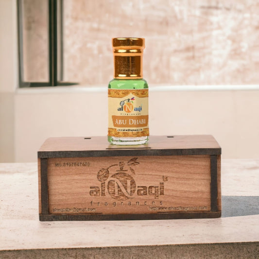 Elegant glass bottle of luxury fragrance on a wooden table