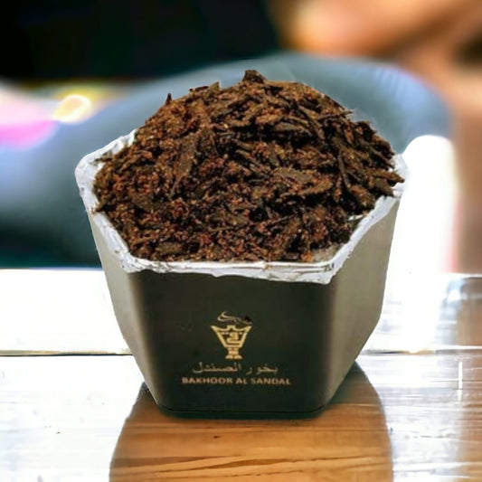 Sandalwood incense pieces arranged elegantly in a decorative container