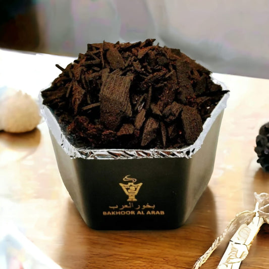 Premium bakhoor pieces on a decorative incense burner