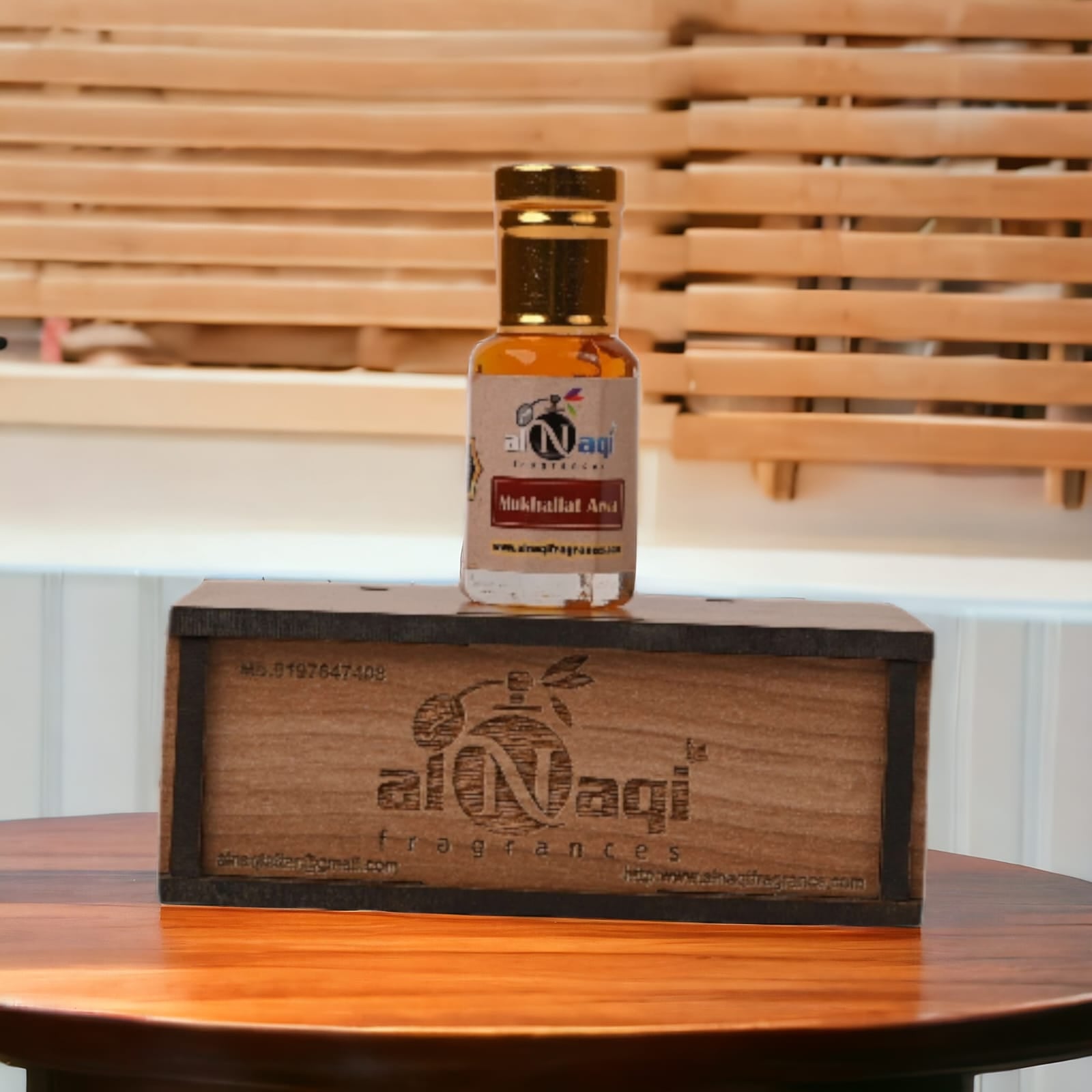 Luxurious packaging of Arabian Musk Attar featuring decorative details.
