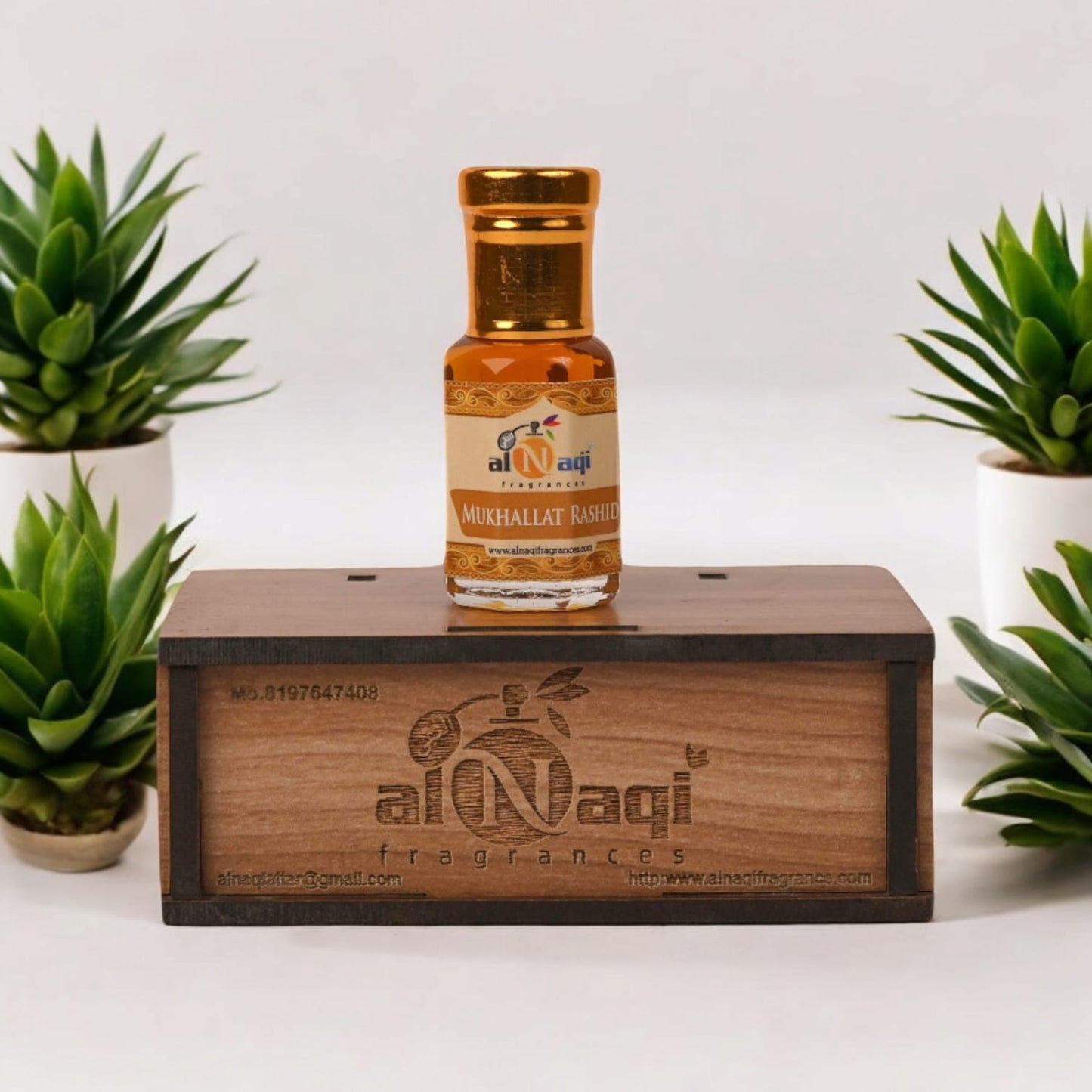 Close-up of the luxurious attar inside a sleek, modern glass container.