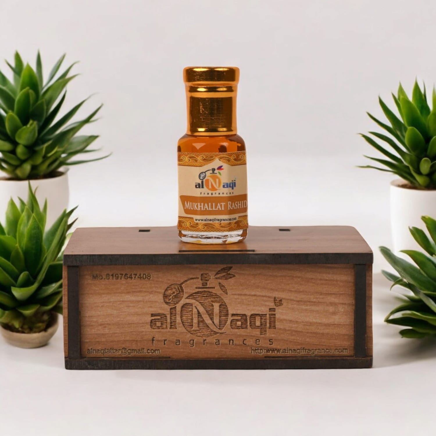 Close-up of the luxurious attar inside a sleek, modern glass container.