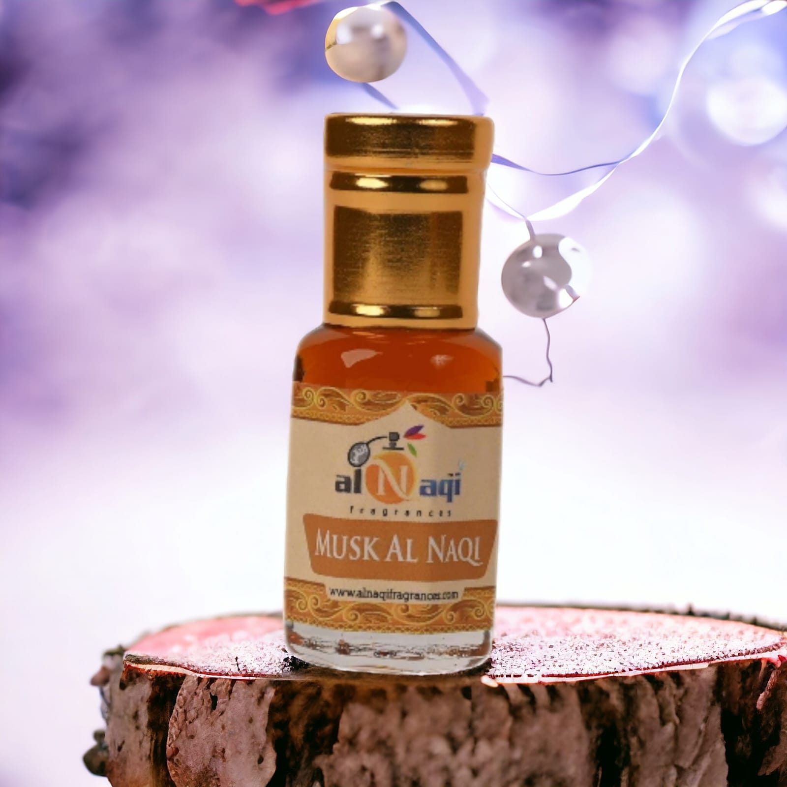 Hands applying attar to wrist for long-lasting scent experience