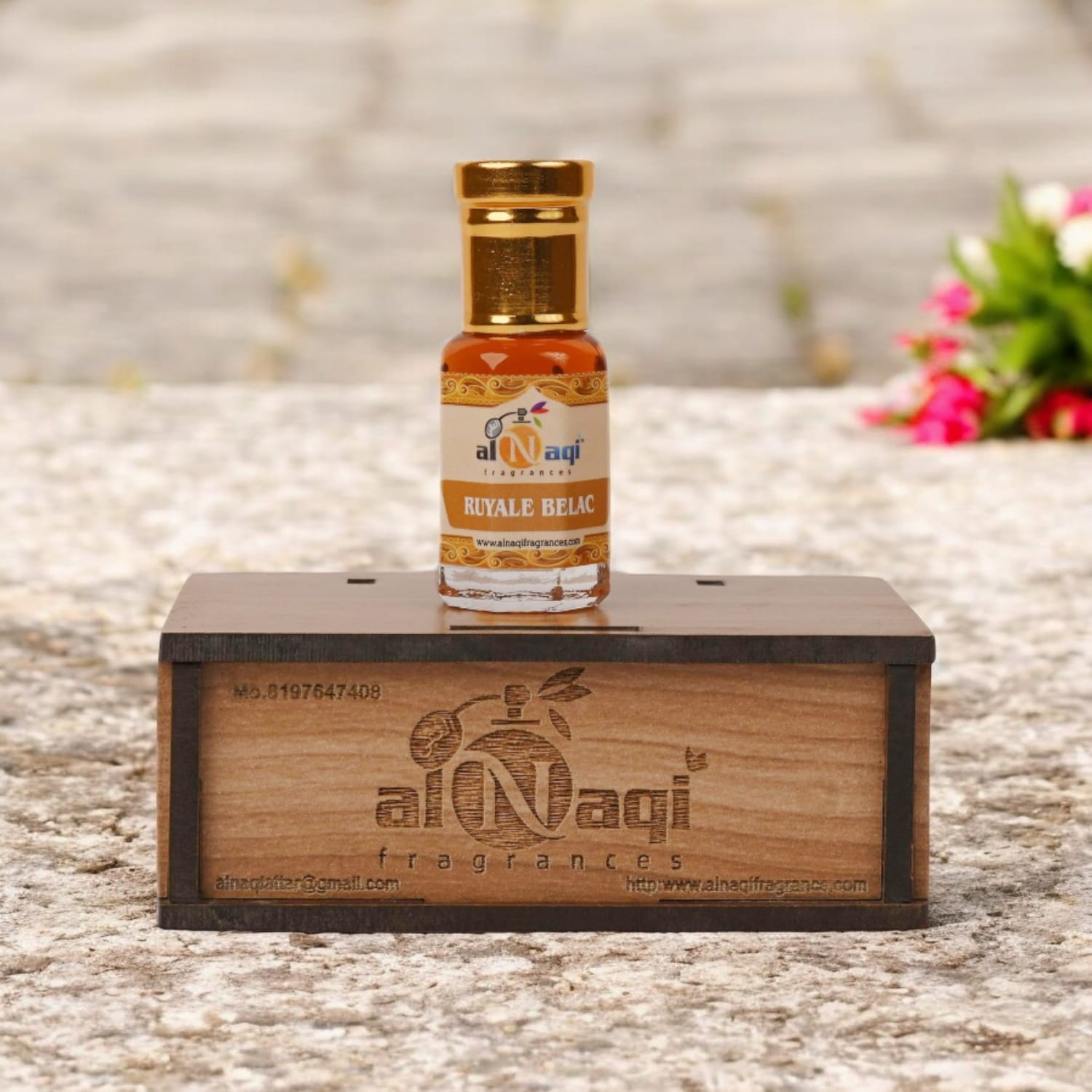 Refined perfume oil with a rich, golden hue on display