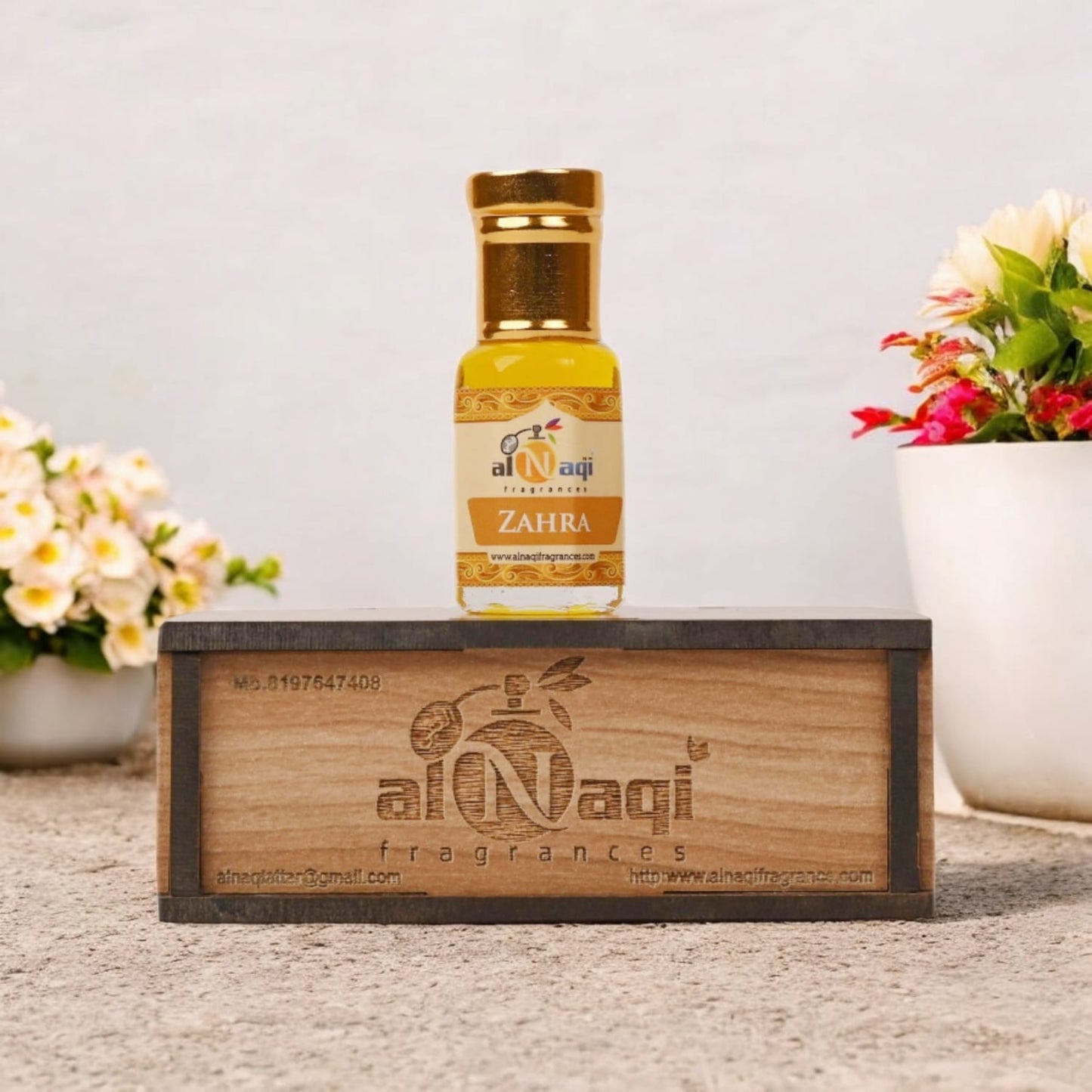 Elegant bottle of Zahra Essence showcasing intricate design details.