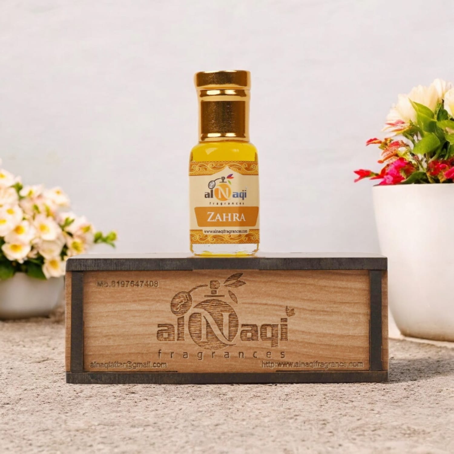 Elegant bottle of Zahra Essence showcasing intricate design details.