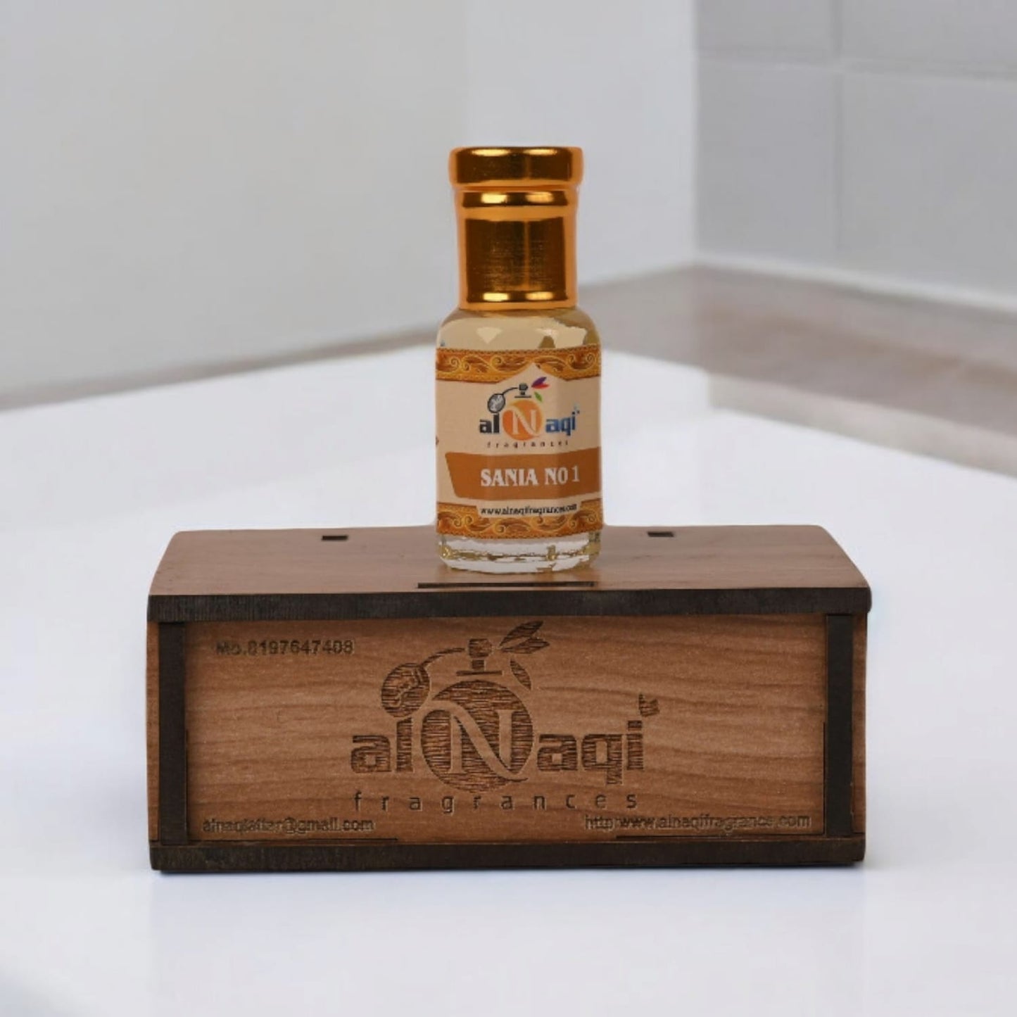 A handcrafted luxury attar bottle displayed elegantly against a neutral background