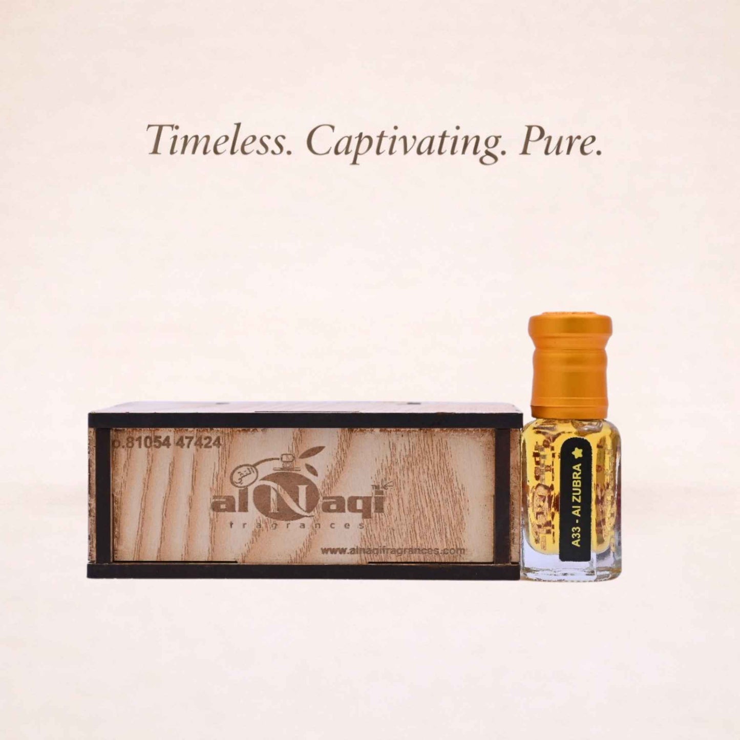 Perfume bottle with wooden box and 'al-Naqi' branding on a beige background