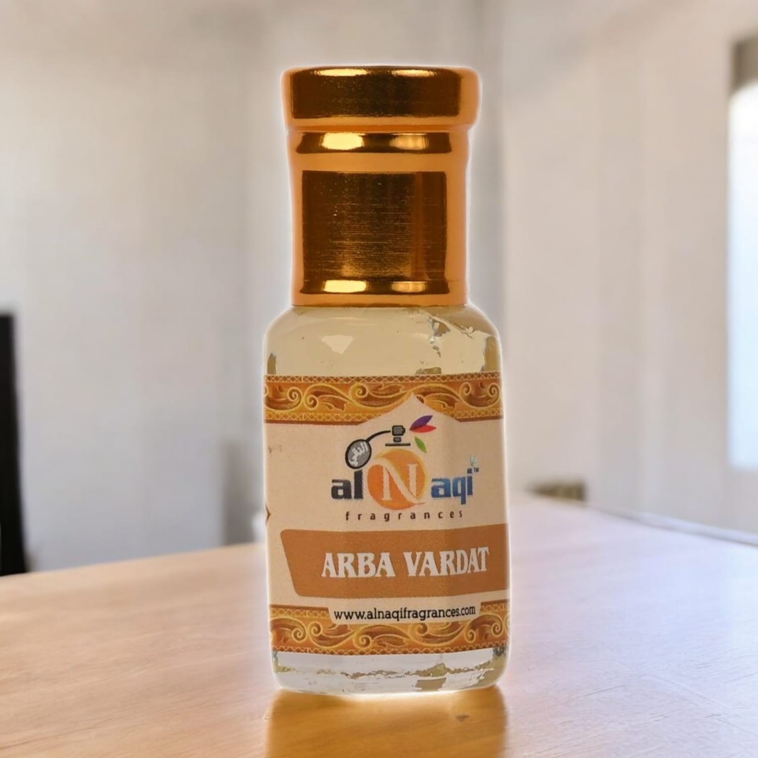 Detailed view of the rich liquid inside the Alnaqi Arba Vardat attar bottle.
.