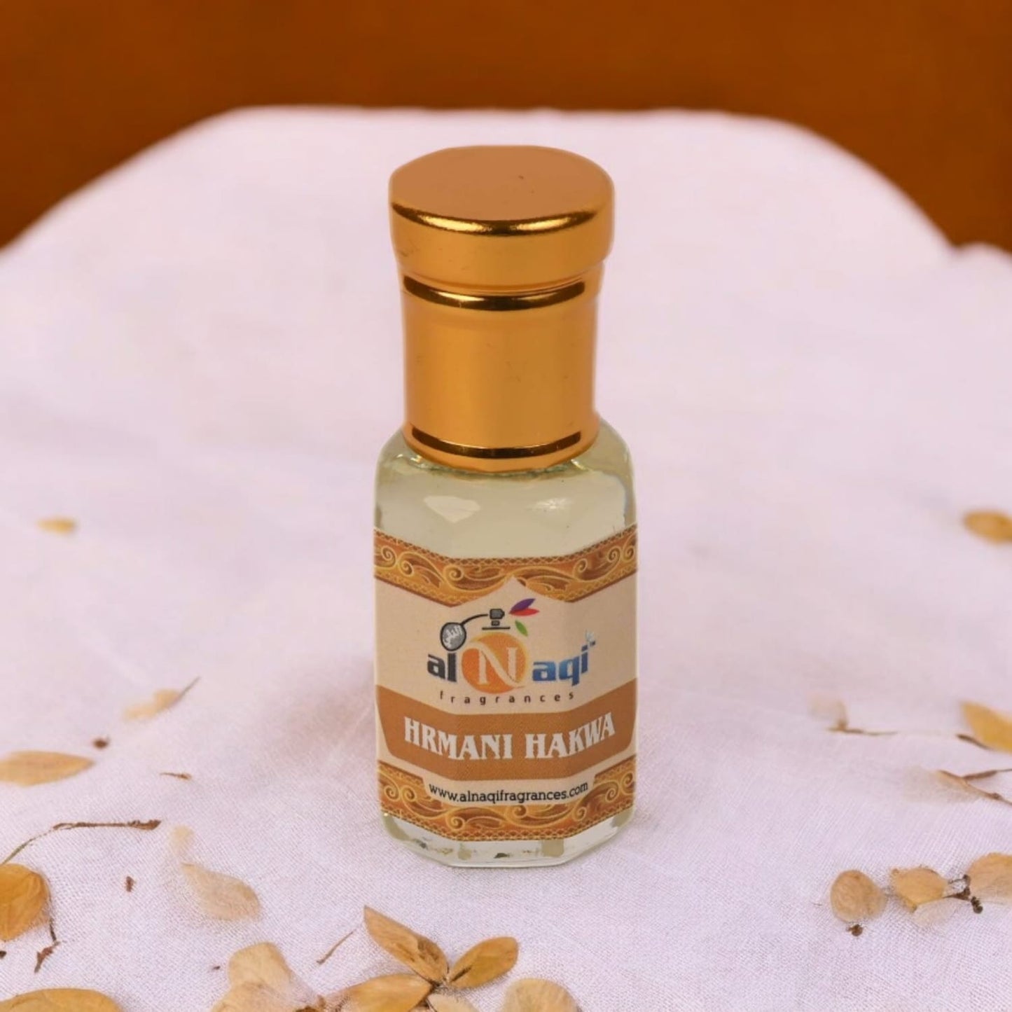 Detailed look at the rich, dark liquid inside the Harmani Hakwa attar bottle.