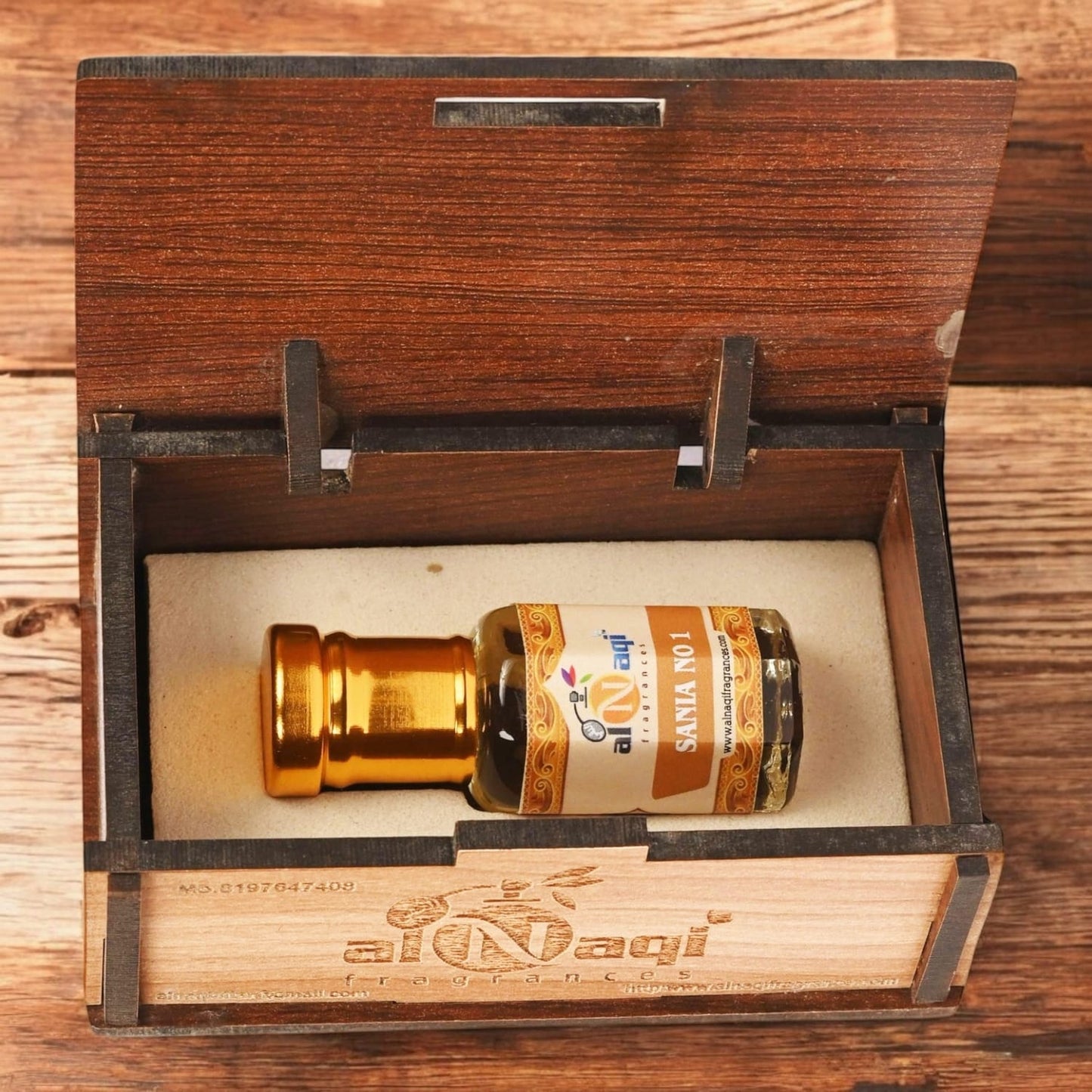 Stylish unisex fragrance bottle placed on a textured surface, exuding timeless elegance.