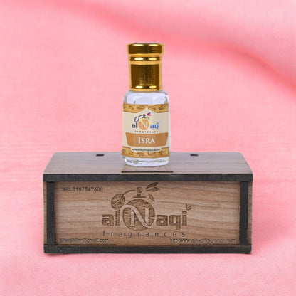 Attar bottle with golden accents, emphasizing its premium quality.
