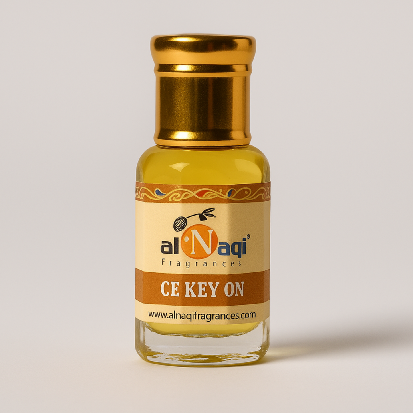 Fragrance bottle with gold cap and labeled CA KEY ON on a light gray background