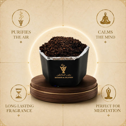 Alnaqi Bakhoor Al Salateen wood chips releasing fragrant smoke on a traditional incense burner