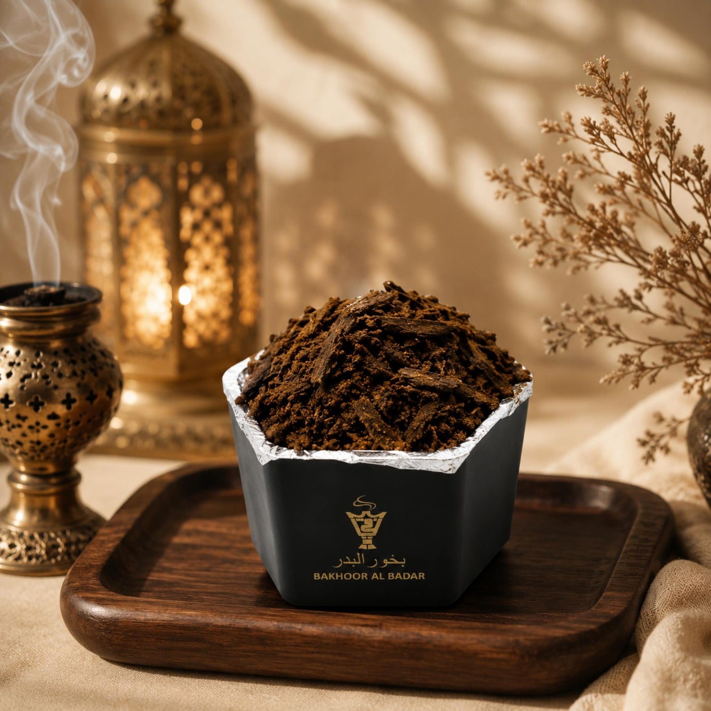 Close-up shot of rich, resinous Alnaqi Bakhoor Al Badar natural agarwood incense chips