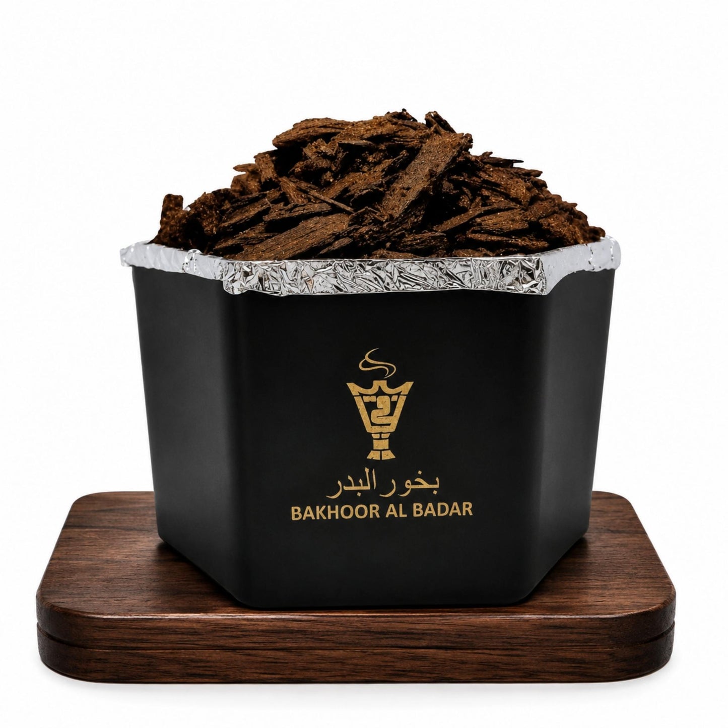 Front view of Alnaqi Bakhoor Al Badar 50g jar containing natural aromatic wood chips