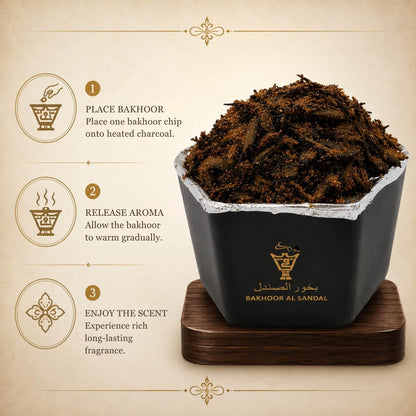 Alnaqi Bakhoor Al Sandal sandalwood chips smoking gently on an incense burner for home aroma