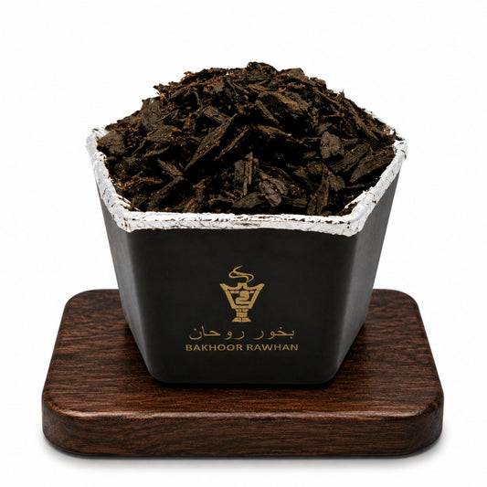 Front view of Alnaqi Bakhoor Rawhan 50g jar containing natural aromatic wood chips
