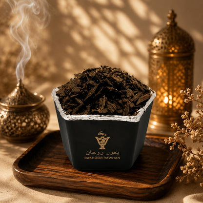 Close-up shot of rich resinous Alnaqi Bakhoor Rawhan natural agarwood incense chips