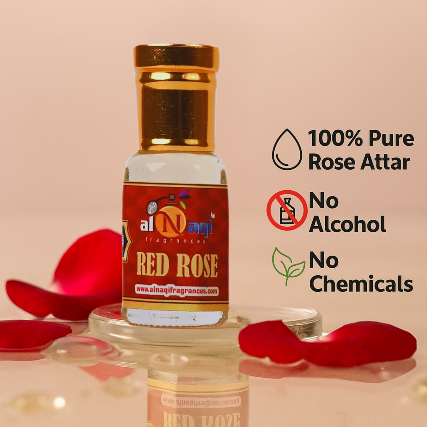 Bottle of red rose attar with red rose petals on a beige background