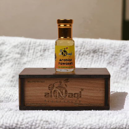 Elegant bottle of Arabian Fawakeh Attar with intricate design. 