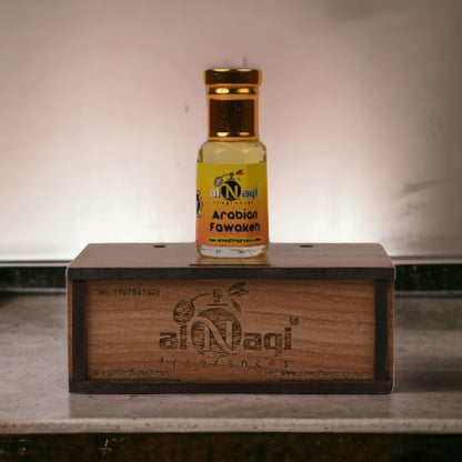 Luxurious Arabian Fawakeh Attar packaging with ornate details. 