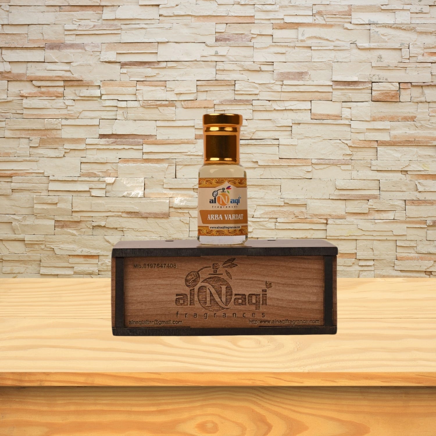 Close-up of the elegant Arba Vardat attar bottle with intricate design details.