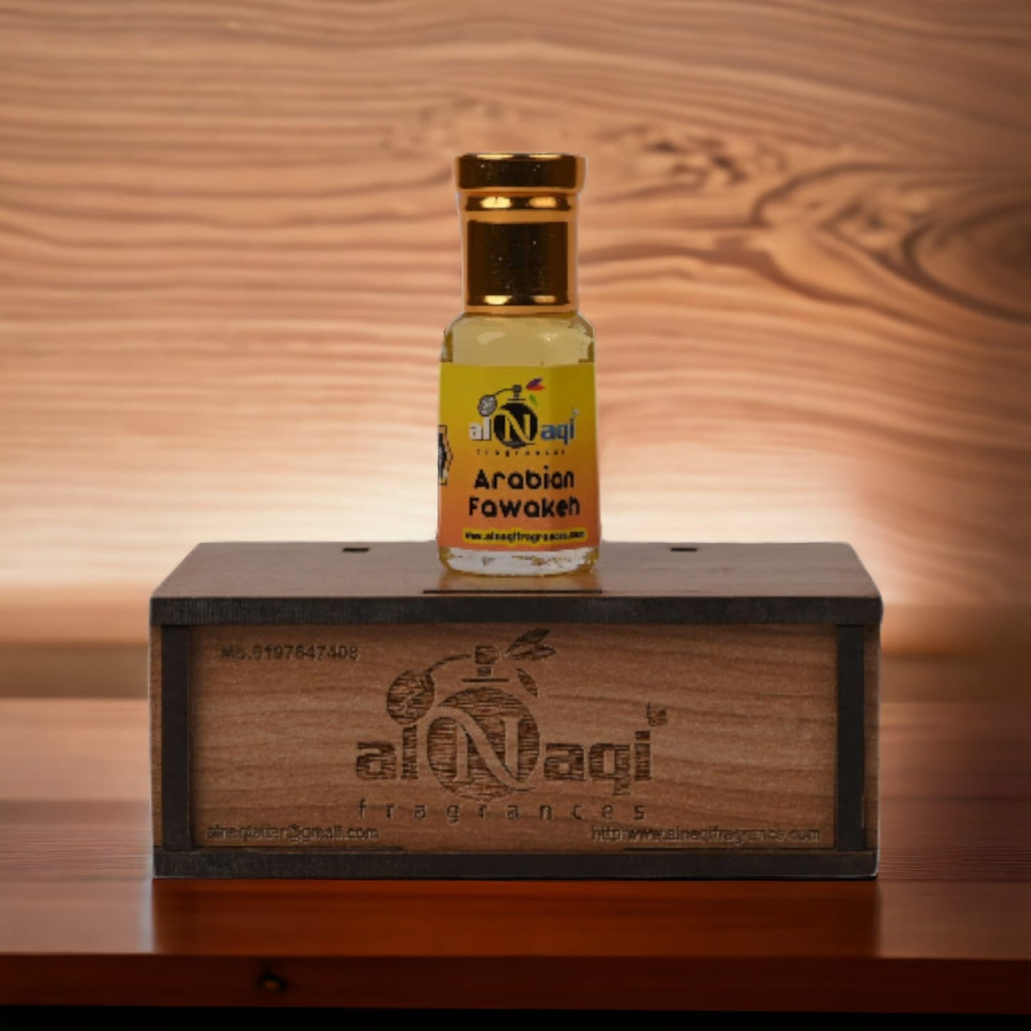 Close-up of golden liquid inside Arabian Fawakeh Attar bottle. .