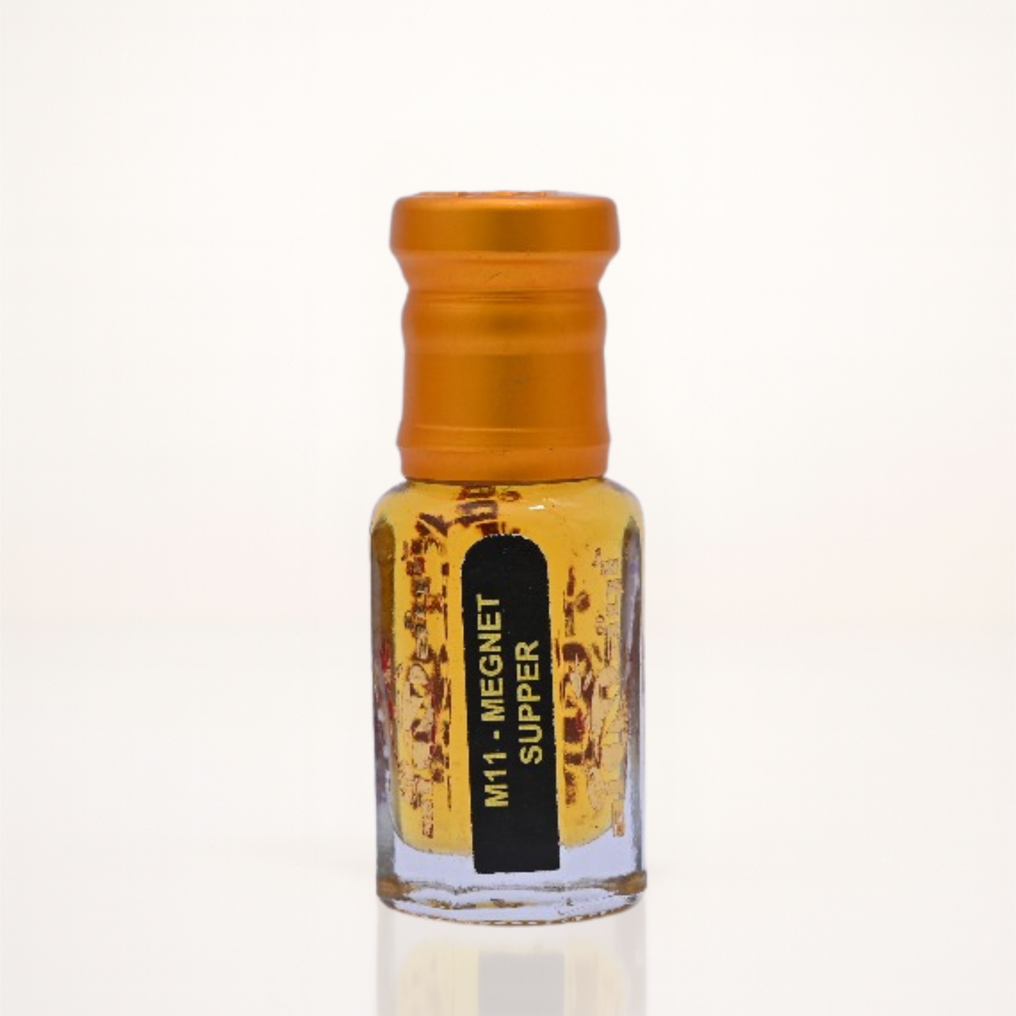 Small glass bottle with an orange cap on a white background