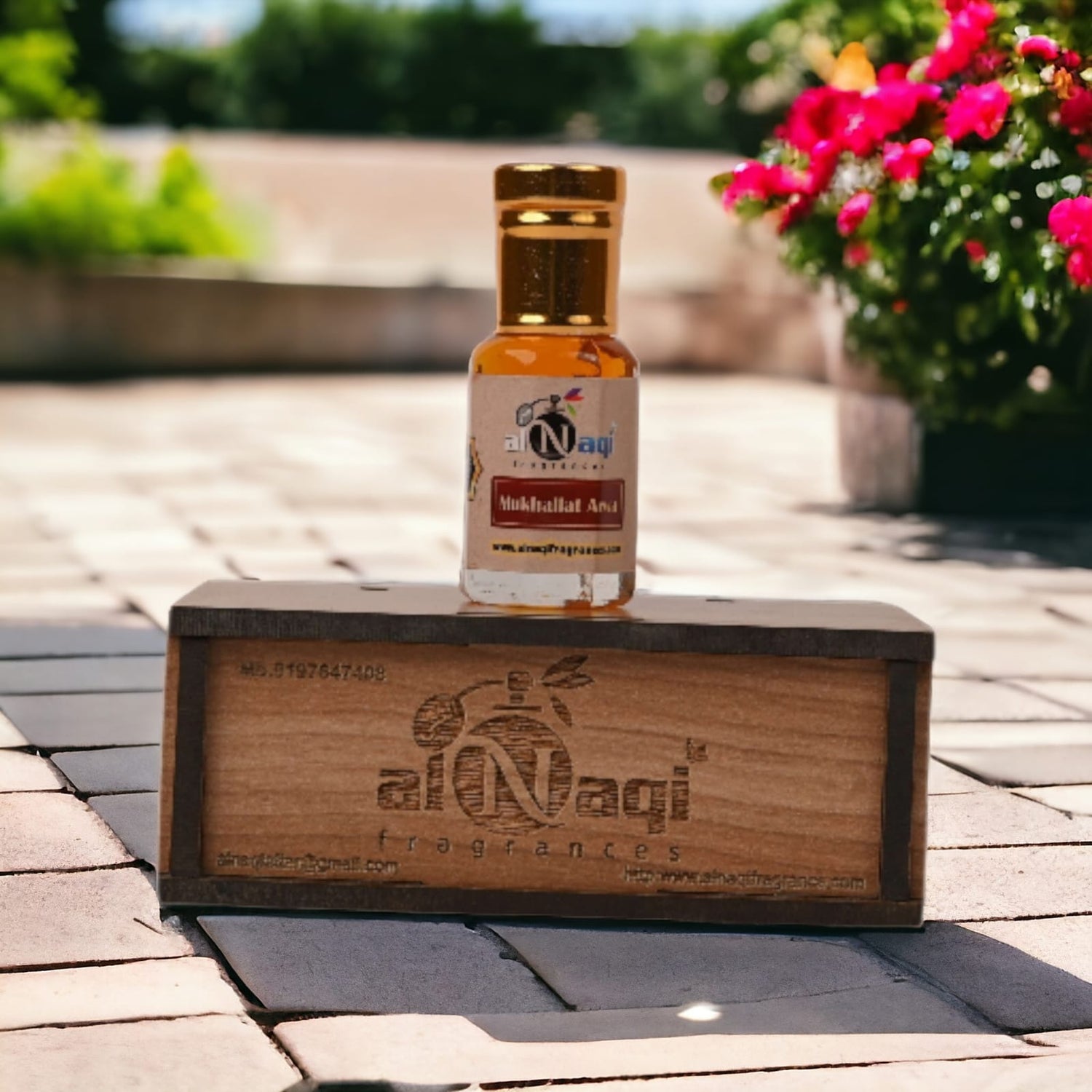 Elegant bottle of Arabian Musk Attar with intricate design.
