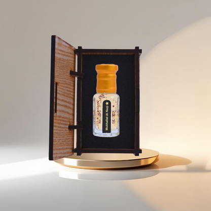 Small bottle with a wooden cap inside an open wooden box on a white surface.