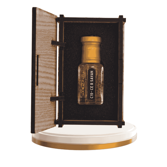 Elegant glass perfume bottle with gold accents