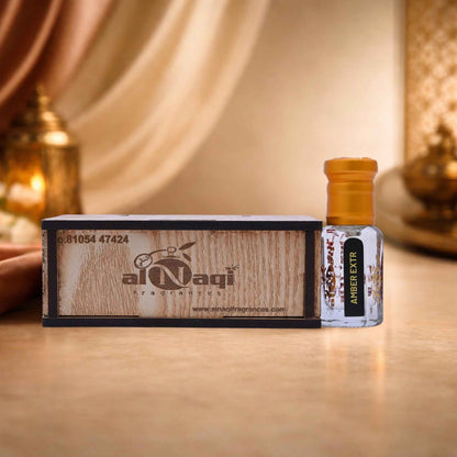 Al Naji perfume bottle and box on a wooden surface with warm lighting